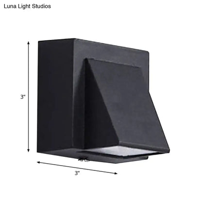 Black Decorbites outdoor two-light wall sconce with angular trapezoid shade on Tampa Home & Garden Store