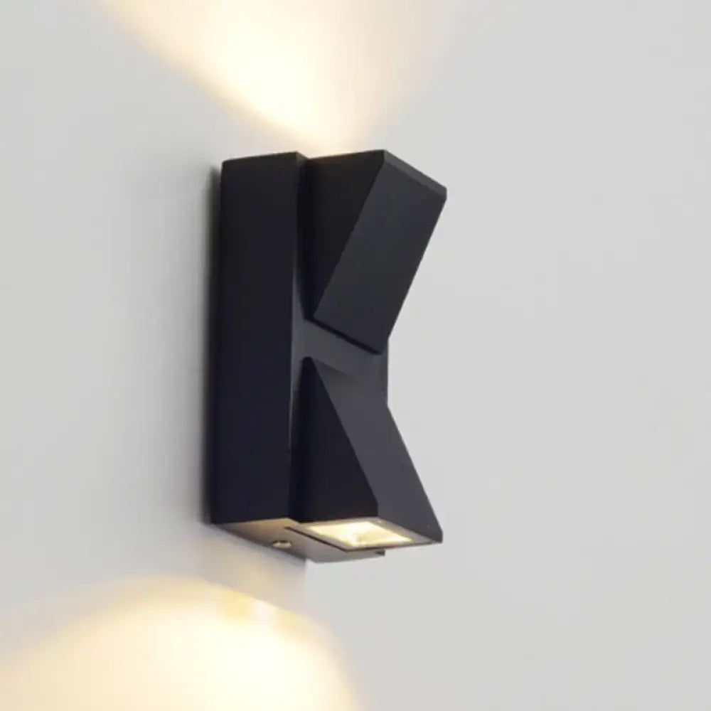 Black Decorbites outdoor two-light wall sconce with angular geometric shade on Tampa Home & Garden Store