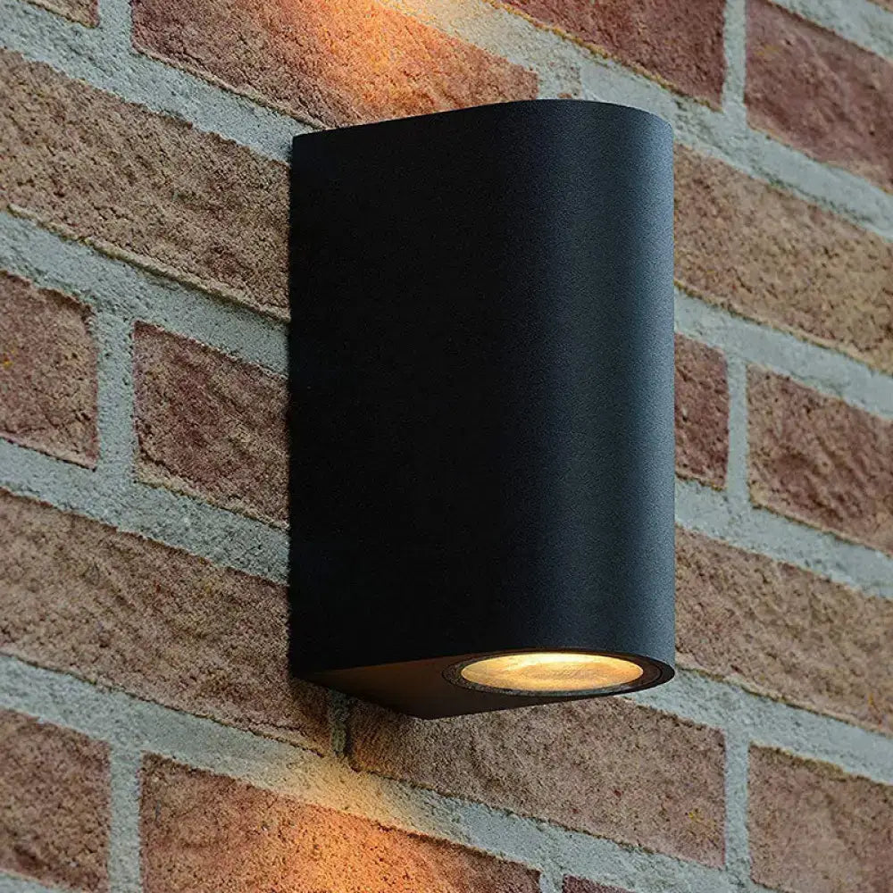 Black Outdoor Patio Two-Light Wall Sconce by Decorbites, matte black metal, with warm glow on Tampa Home & Garden Store