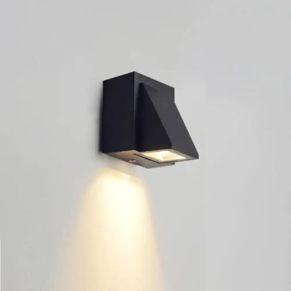 Black outdoor patio two-light wall sconce with a cube metal body and downward glow on Tampa Home & Garden Store