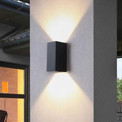 Black outdoor patio two-light wall sconce in rectangular metal silhouette on Tampa Home & Garden Store