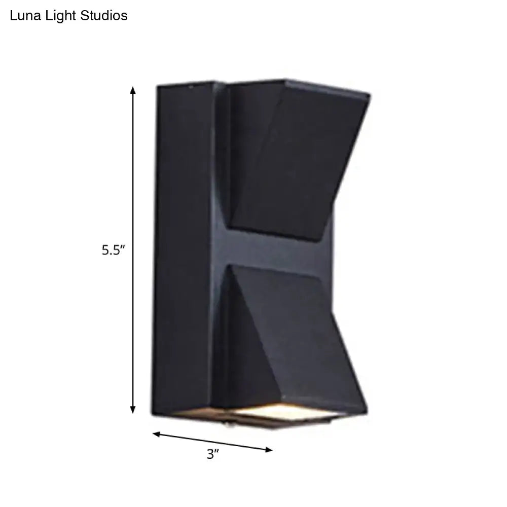 Black outdoor two-light wall sconce by Decorbites with angular housing, 5.5 in high by 3 in wide on Tampa Home & Garden Store