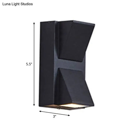 Black outdoor two-light wall sconce by Decorbites with angular housing, 5.5 in high by 3 in wide on Tampa Home & Garden Store