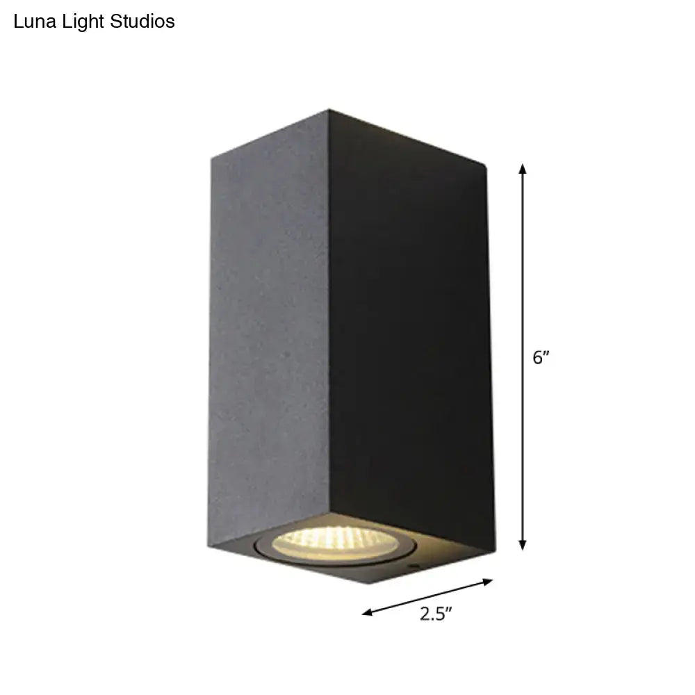 Black metal outdoor patio two-light wall sconce by Decorbites with block housing 6in tall wide on Tampa Home & Garden Store