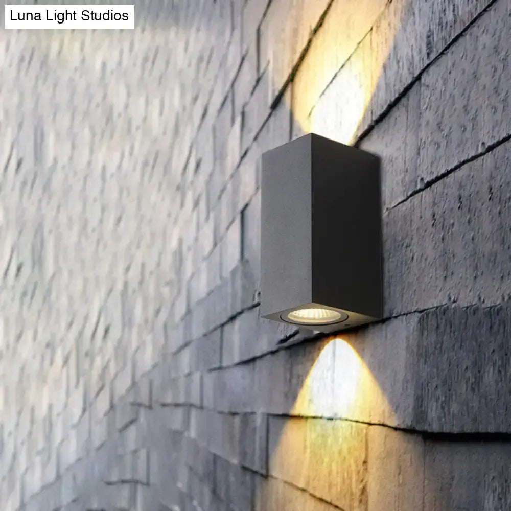 Black outdoor patio two-light wall sconce with cube-style exterior mount on Tampa Home & Garden Store