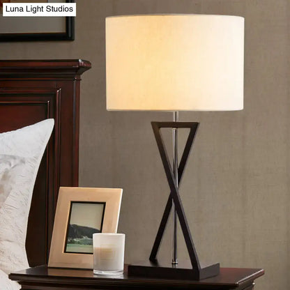 Decorbites Black Nightstand Drum Lamp with white drum shade and crisscross metal base on Tampa Home & Garden Store