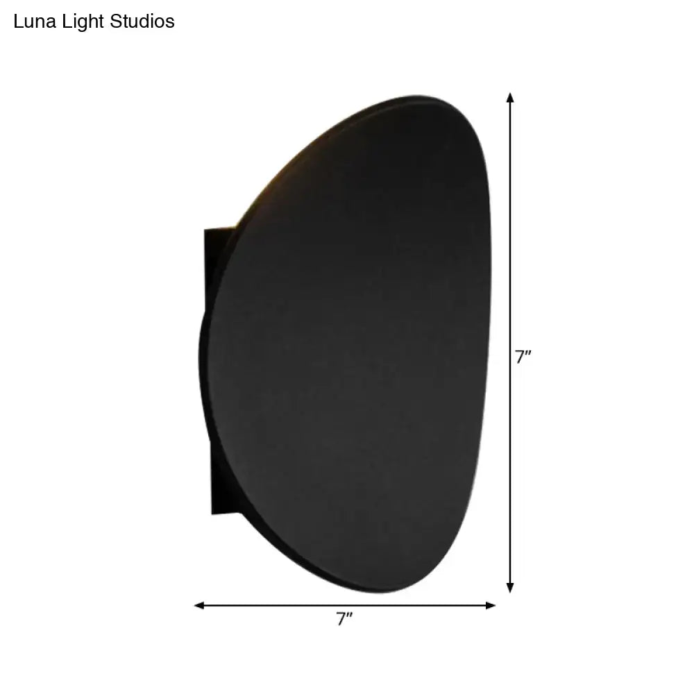 Black geometric wall fixture disc-shaped sconce, 7-inch diameter, Decorbites on Tampa Home & Garden Store