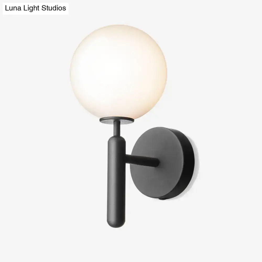 Black Glass Globe Lamp wall sconce by Decorbites with white globe and matte black mount on Tampa Home & Garden Store