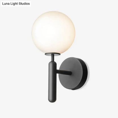 Black Glass Globe Lamp wall sconce by Decorbites with white globe and matte black mount on Tampa Home & Garden Store
