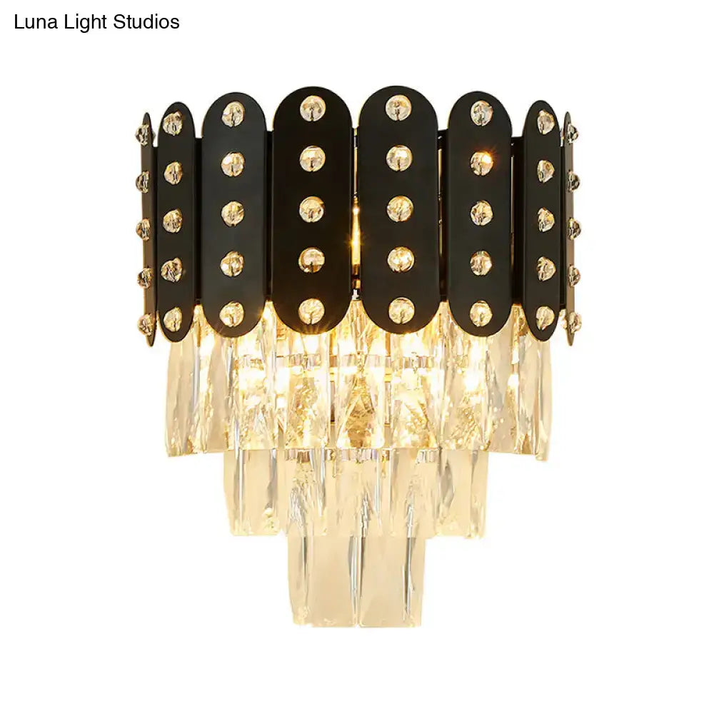 Black Crystal Three-Tier Wall Light by Decorbites with metal panels and hanging prisms on Tampa Home & Garden Store