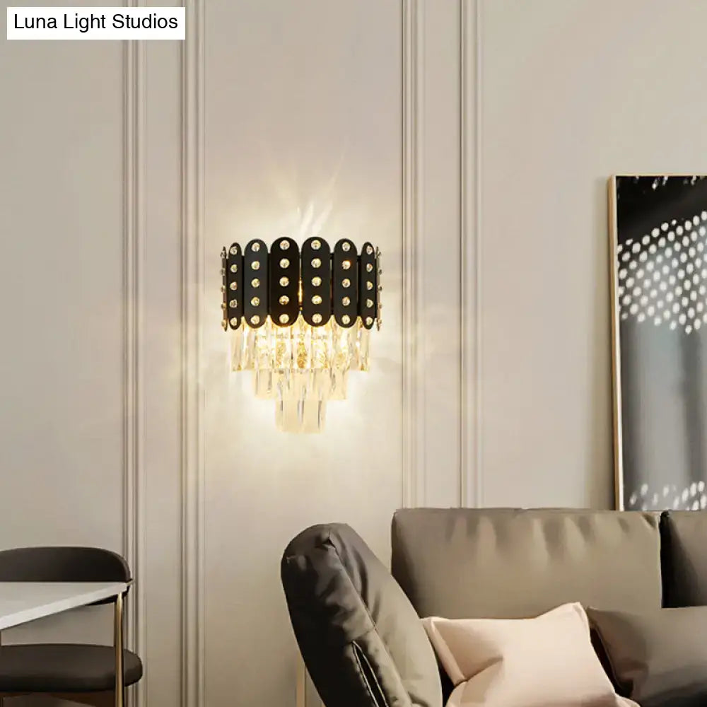 Black Crystal Three-Tier Faceted Wall Light by Decorbites with hanging prisms, warm glow on Tampa Home & Garden Store