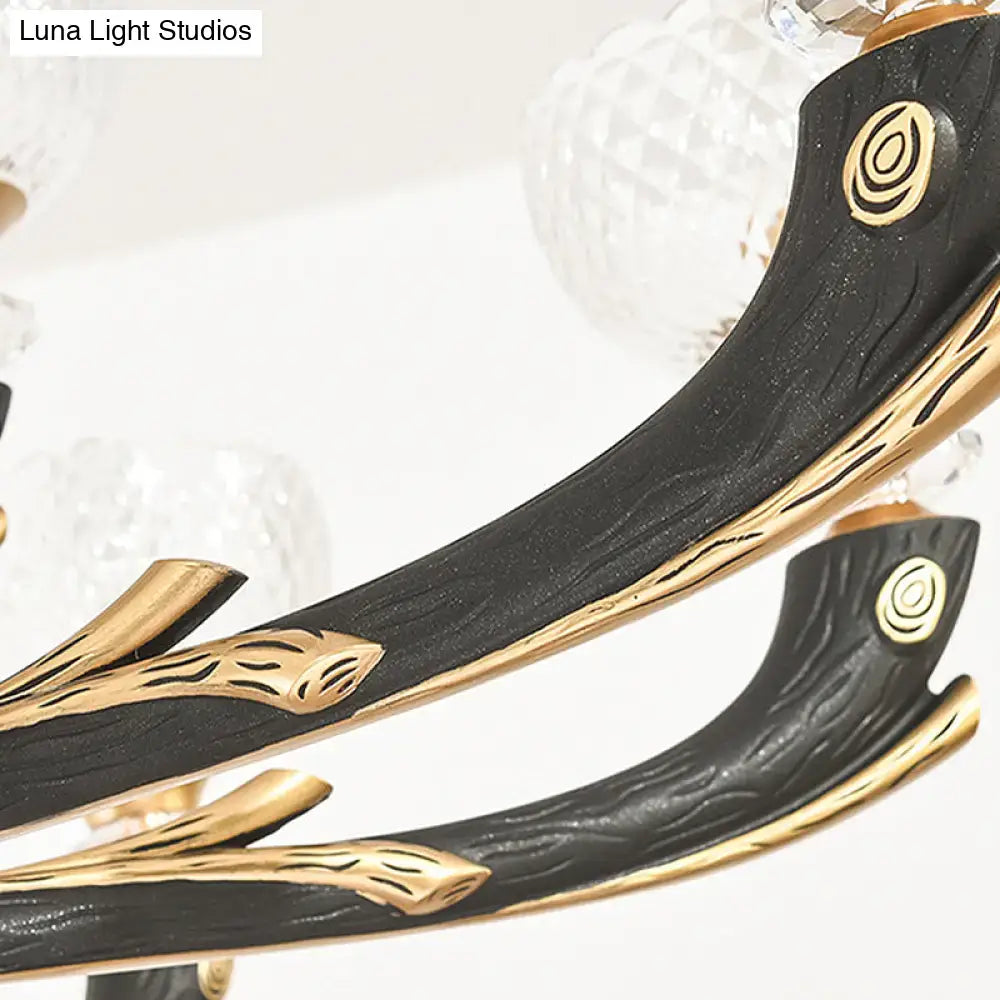 Black Gold Branch Sconce with carved woodgrain branches and gold accents by Decorbites on Tampa Home & Garden Store