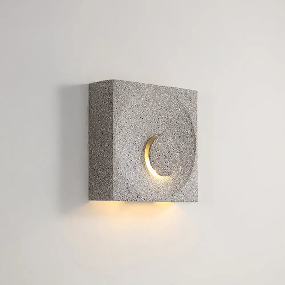Cement Nordic Wall Sconce, gray concrete cube with gold crescent cutout, Decorbites, warm LED lighting on Tampa Home & Garden Store