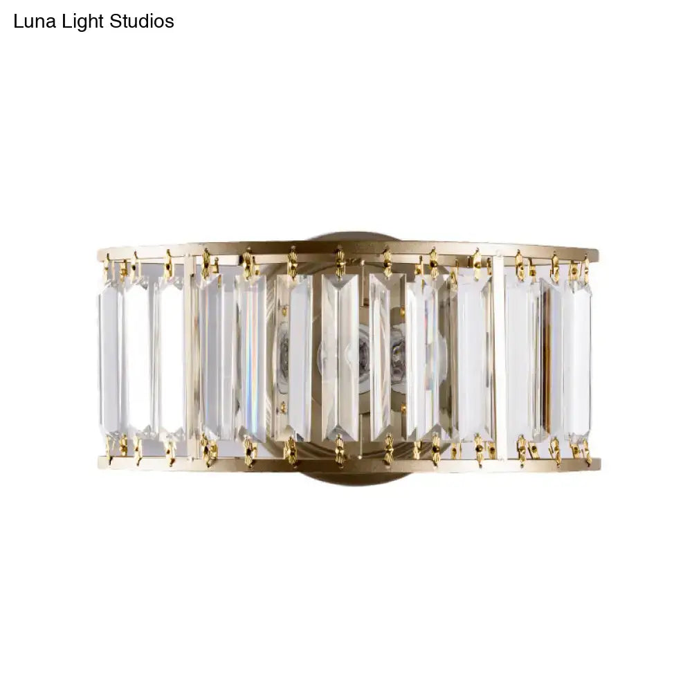Gold crystal half-cylinder sconce by Decorbites in gold metal with clear prisms on Tampa Home & Garden Store