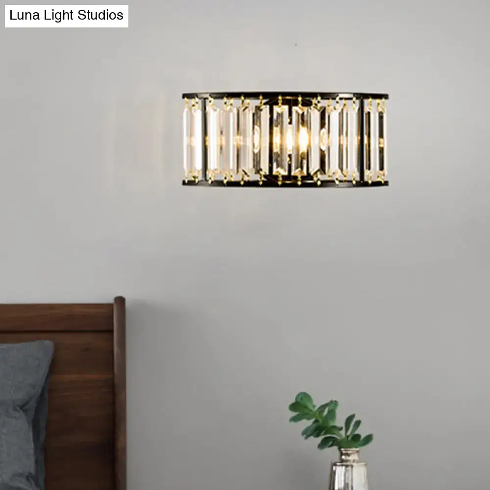Gold crystal half-cylinder wall sconce with black metal frame on Tampa Home & Garden Store