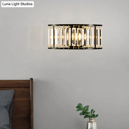 Gold crystal half-cylinder wall sconce with black metal frame on Tampa Home & Garden Store