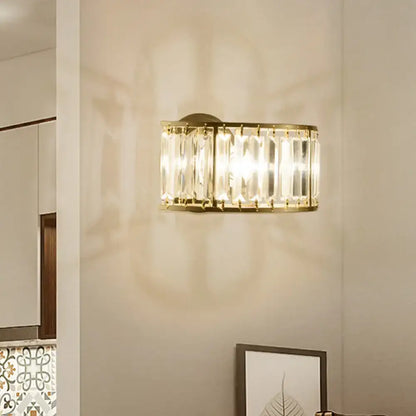 Gold crystal half-cylinder wall sconce Decorbites with black-gold finish and clear prisms on Tampa Home & Garden Store