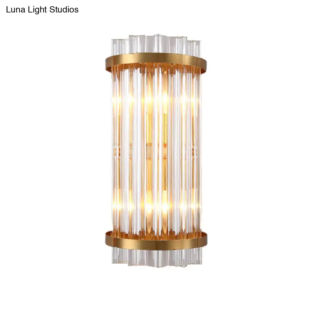 Black Gold Rod Wall Sconce lighting fixture with clear glass rods and brass bands on Tampa Home & Garden Store