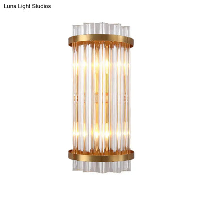 Black Gold Rod Wall Sconce lighting fixture with clear glass rods and brass bands on Tampa Home & Garden Store