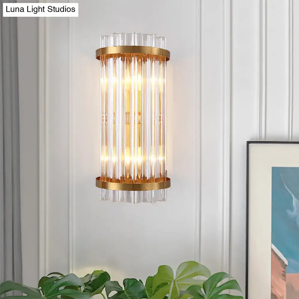 Black Gold Rod Wall Sconce with clear glass rods and gold-tone rings, warm glow Decorbites on Tampa Home & Garden Store