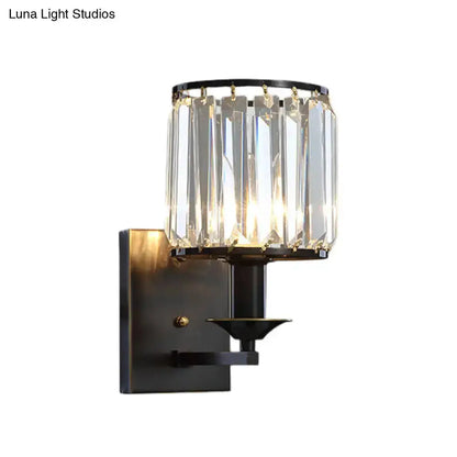 Decorbites modern black and gold crystal wall sconce light fixture with a square backplate on Tampa Home & Garden Store
