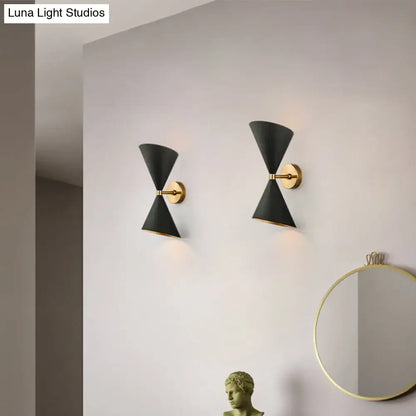Black Gold Cone Sconce pair by Decorbites with brass mounts on wall on Tampa Home & Garden Store