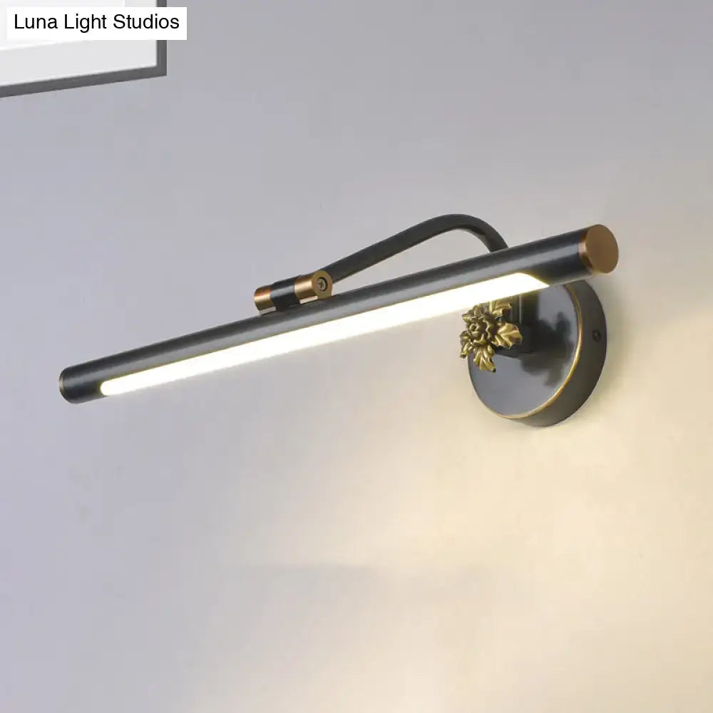 Black brass vanity sconce by Decorbites with cylindrical LED tube, wall-mounted on Tampa Home & Garden Store