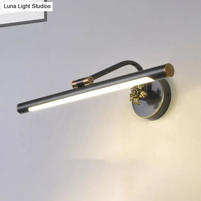 Black brass vanity sconce by Decorbites with cylindrical LED tube, wall-mounted on Tampa Home & Garden Store