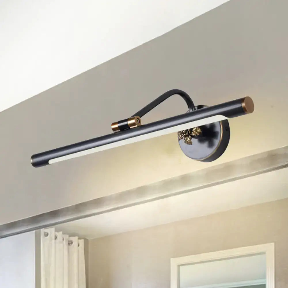 Black brass vanity sconce by Decorbites with slim cylindrical bar and copper accent wall mount on Tampa Home & Garden Store