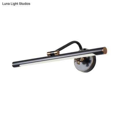 Black brass vanity sconce with cylindrical LED bar and gold accents, wall-mount fixture on Tampa Home & Garden Store