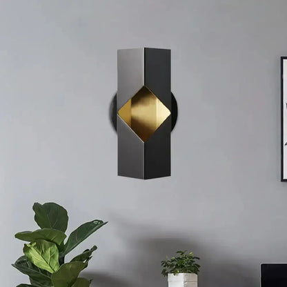Geometric LED sconce, modern black and gold iron shade, Decorbites bedroom fixture on Tampa Home & Garden Store