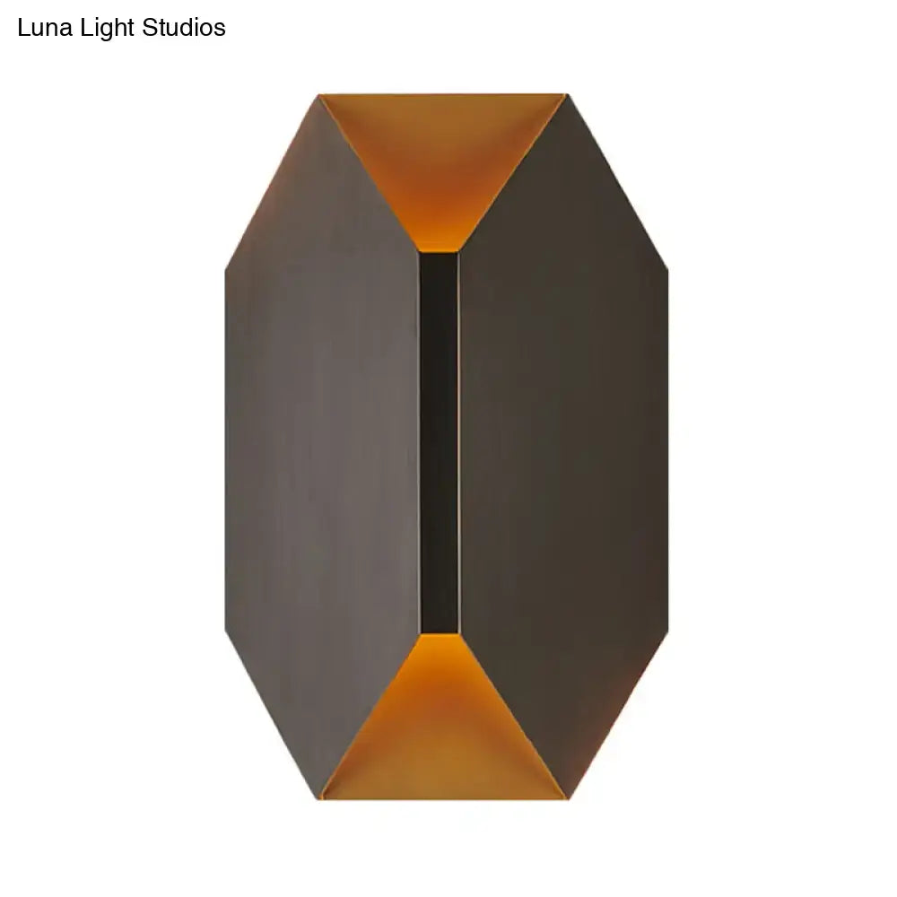Black metal geometric wall lamp by Decorbites with orange interior accents on Tampa Home & Garden Store
