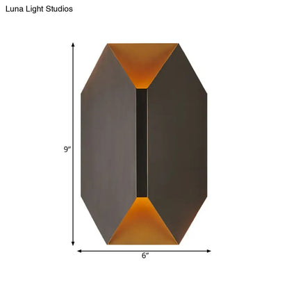 Black metal geometric wall lamp with copper interior accents by Decorbites on Tampa Home & Garden Store