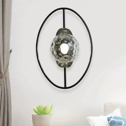 Modern black & gold glass orb wall lamp with oval black metal ring by Decorbites on Tampa Home & Garden Store