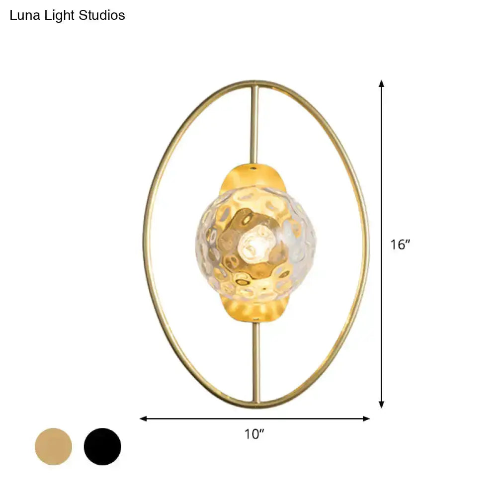 Modern gold glass orb wall lamp by Decorbites with oval frame 16in tall 10in wide on Tampa Home & Garden Store