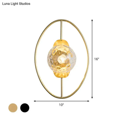 Modern gold glass orb wall lamp by Decorbites with oval frame 16in tall 10in wide on Tampa Home & Garden Store