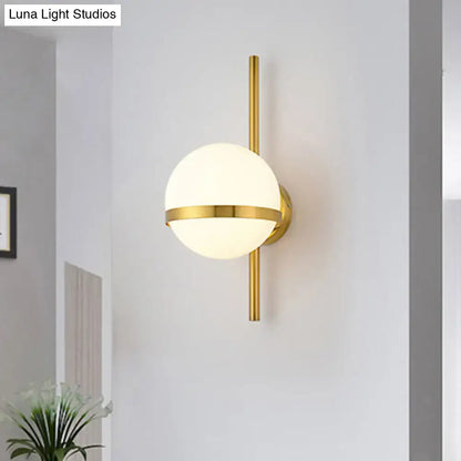 Black Gold Glass Sconce by Decorbites, gold wall sconce with frosted glass globe on Tampa Home & Garden Store