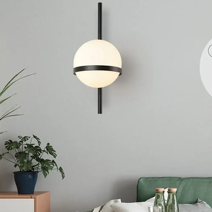 Black Gold Glass Sconce by Decorbites, white globe shade with gold band on black wall mount on Tampa Home & Garden Store