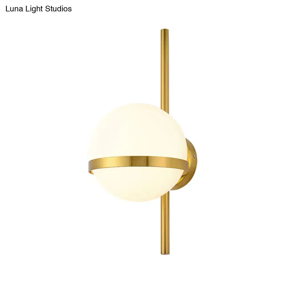 Black Gold Glass Sconce by Decorbites, brass finish with frosted glass globe on Tampa Home & Garden Store