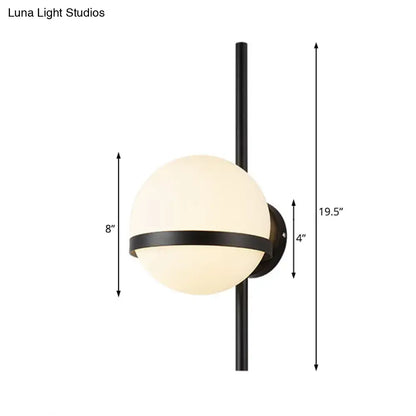 Black Gold Glass Sconce by Decorbites, frosted glass globe with black metal band and vertical mount on Tampa Home & Garden Store