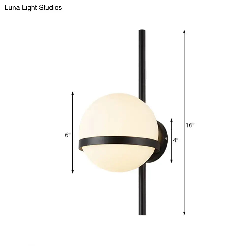 Black Gold Glass Sconce by Decorbites with frosted globe and black metal band on Tampa Home & Garden Store