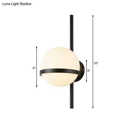 Black Gold Glass Sconce by Decorbites with frosted globe and black metal band on Tampa Home & Garden Store