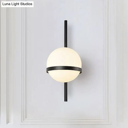 Black Gold Glass Sconce by Decorbites with frosted globe and black metal mount on Tampa Home & Garden Store