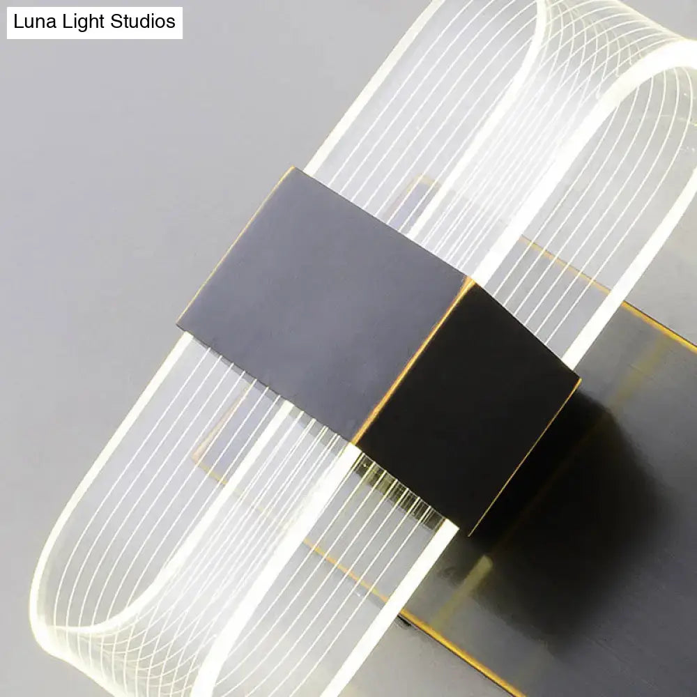 Decorbites black oval LED wall sconce, 1-2 light with white ring glow on Tampa Home & Garden Store