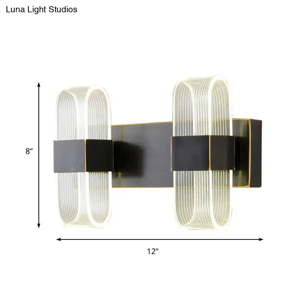 Decorbites black oval LED wall sconce with 2 ribbed glass ovals, 12in wide 8in tall on Tampa Home & Garden Store