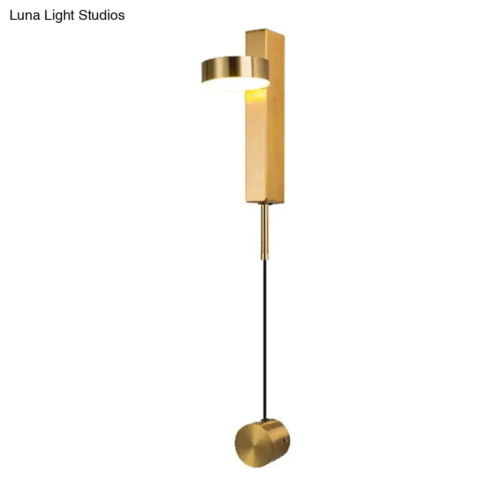 Modern black and gold wall sconce by Decorbites, brass accents and hanging cord bedroom mount on Tampa Home & Garden Store