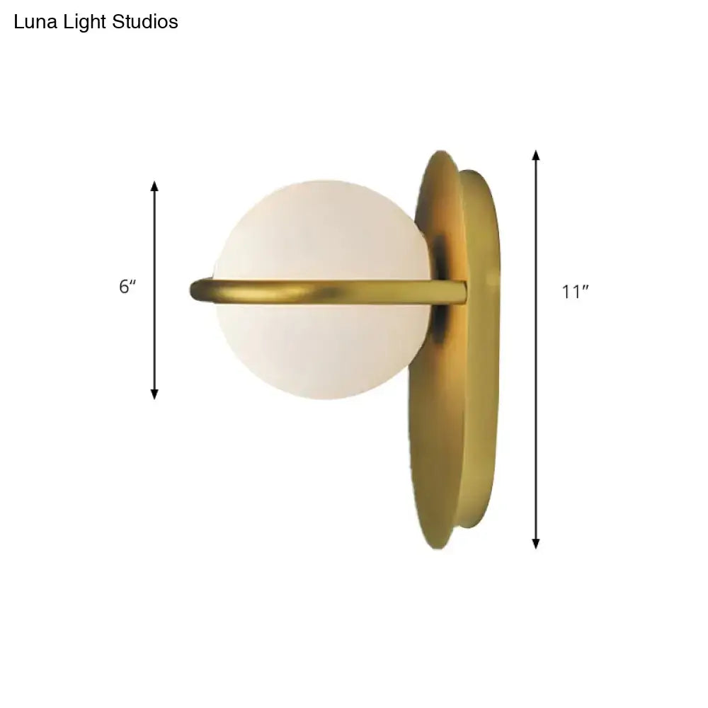 Black Gold Milk Glass Light wall sconce by Decorbites with milk glass globe and brass arm on Tampa Home & Garden Store