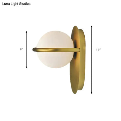 Black Gold Milk Glass Light wall sconce by Decorbites with milk glass globe and brass arm on Tampa Home & Garden Store