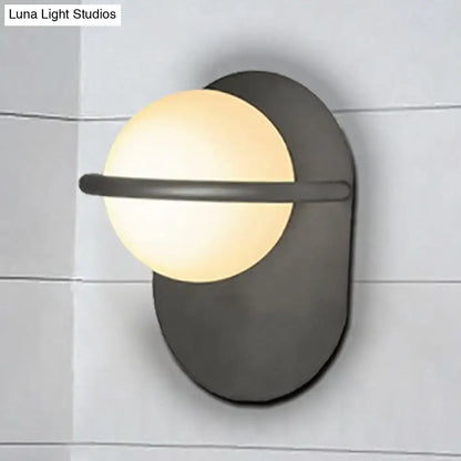 Black Gold Milk Glass Light wall sconce by Decorbites with black backplate and milk glass globe on Tampa Home & Garden Store