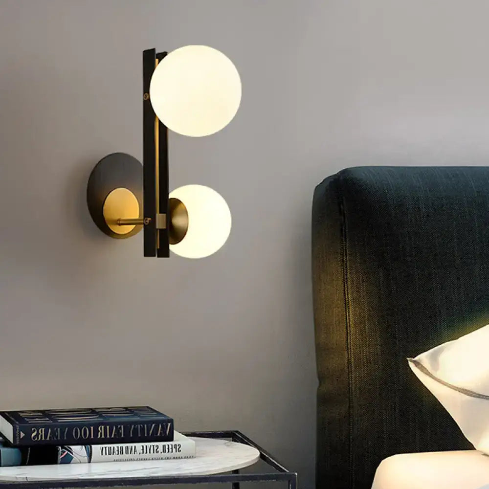 Black Gold Wired Glass Light wall sconce with dual glass globes by Decorbites on Tampa Home & Garden Store